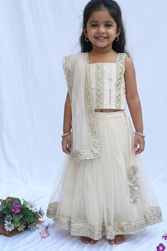 Off white embroidered net lehenga set