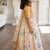Beige off white printed silk lehenga set