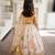 Beige off white printed silk lehenga set