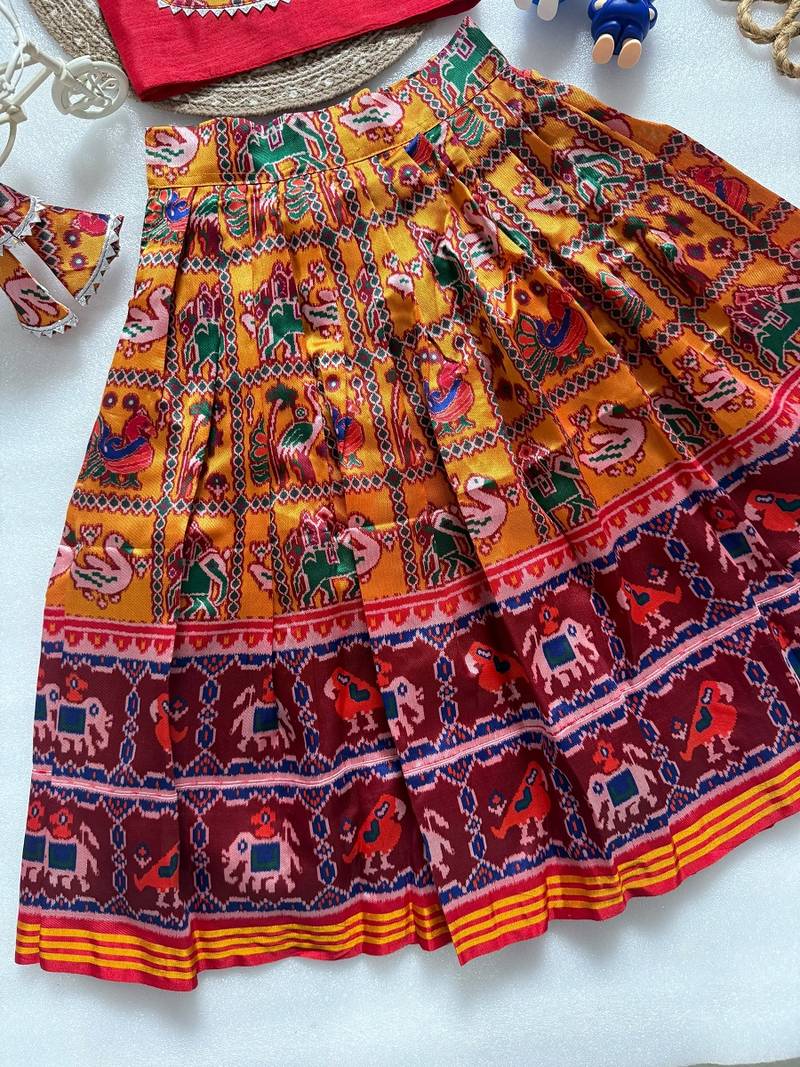 Orange silk blend weaved zari border kids lehenga choli