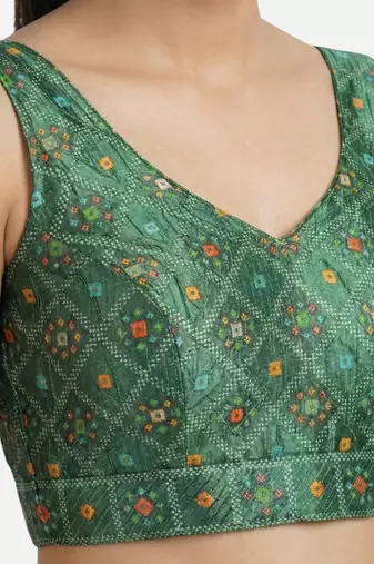 Green printed sleeveless v-neck ethnic saree blouse