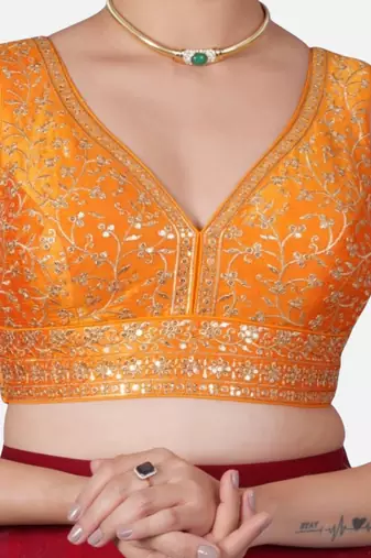 Orange deep neck sleeveless readymade saree blouse