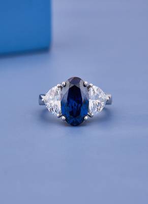 Luxury Blue Sapphire Oval Cut Statement Ring with Pear Cubic Zirconia Side Stones for Women Elegant 1