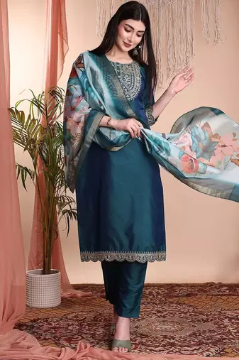 Green color art silk embroidered yoke design kurti pant dupatta set.