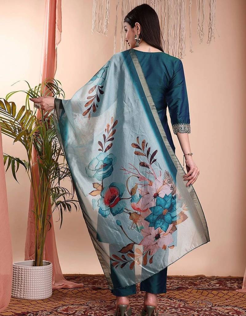 Green color art silk embroidered yoke design kurti pant dupatta set.