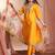 Mustard color art silk embroidered yoke design kurti pant dupatta set.