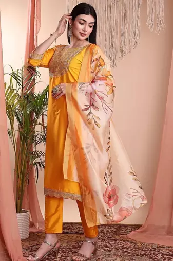 Mustard color art silk embroidered yoke design kurti pant dupatta set.