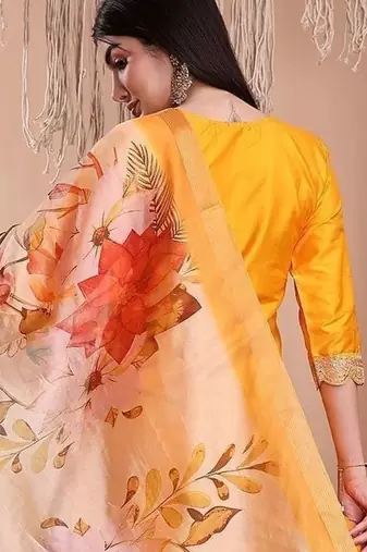 Mustard color art silk embroidered yoke design kurti pant dupatta set.