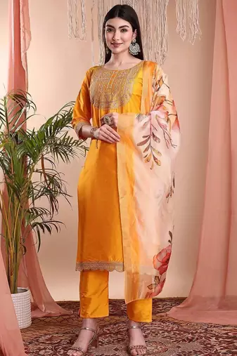Mustard color art silk embroidered yoke design kurti pant dupatta set.