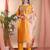 Mustard color art silk embroidered yoke design kurti pant dupatta set.