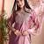 Peach color art silk embroidered yoke design kurti pant dupatta set.