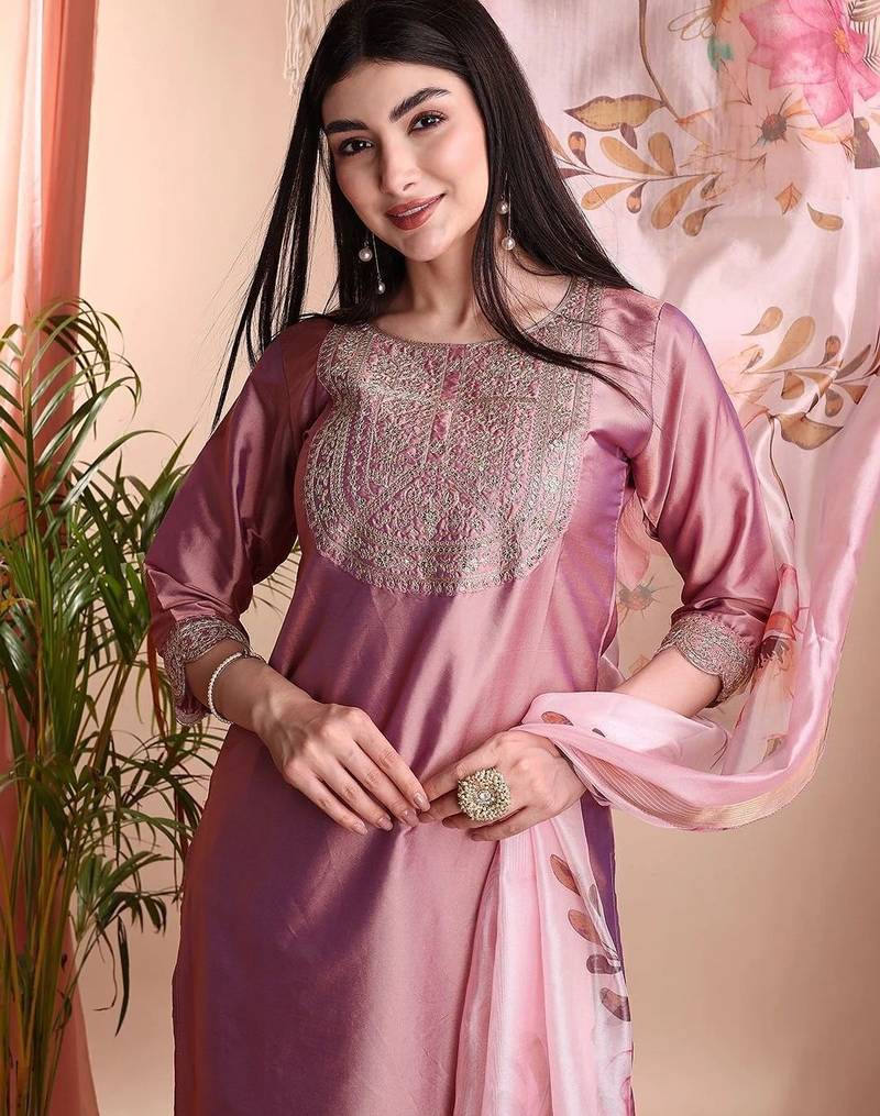 Peach color art silk embroidered yoke design kurti pant dupatta set.