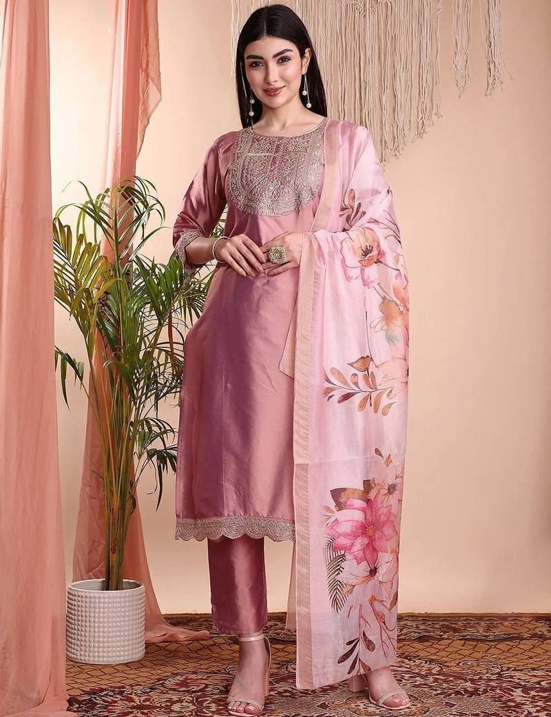 Peach color art silk embroidered yoke design kurti pant dupatta set.