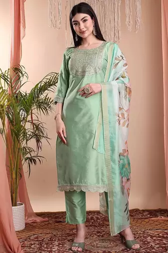 Pista color art silk embroidered yoke design kurti pant dupatta set.