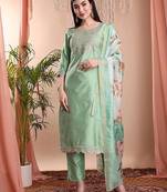 Pista color art silk embroidered yoke design kurti pant dupatta set.
