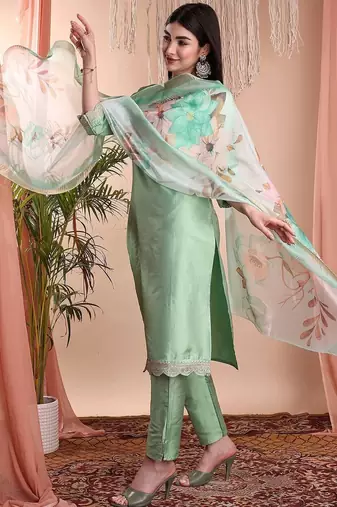Pista color art silk embroidered yoke design kurti pant dupatta set.