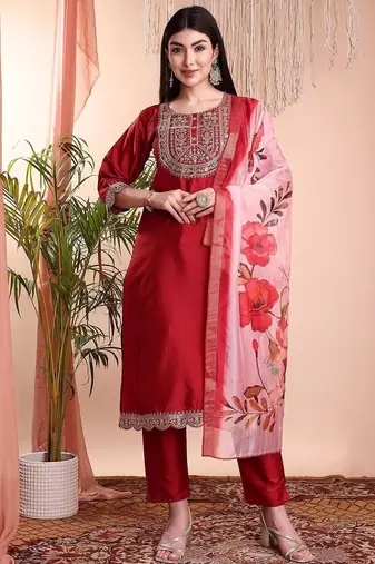 Red color art silk embroidered yoke design kurti pant dupatta set.
