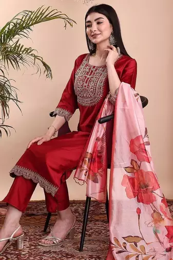 Red color art silk embroidered yoke design kurti pant dupatta set.