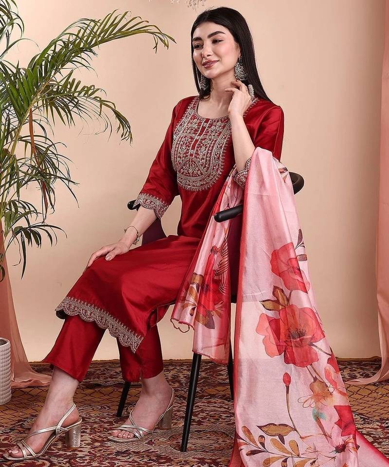 Red color art silk embroidered yoke design kurti pant dupatta set.