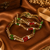 Antique Gold Red & Green Crystal Beaded Wave Bangles