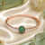 Rose Gold Finish Emerald Orbit American Diamond Bracelet