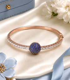 Rose gold finish sapphire orbit american diamond bracelet