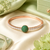 Rose Gold Finish Emerald Orbit American Diamond Bracelet