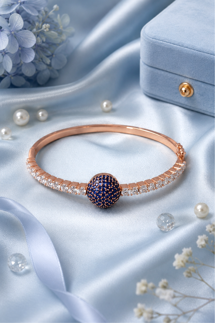 Rose gold finish sapphire orbit american diamond bracelet