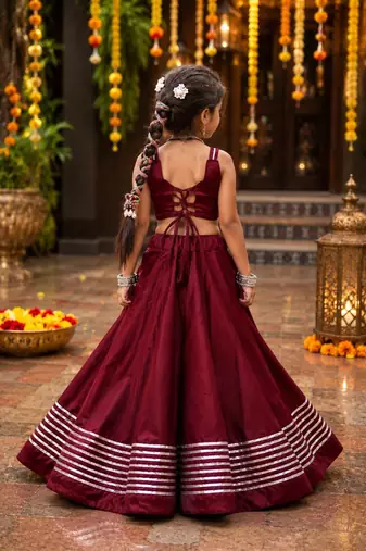 Maroon roman silk girls navratri lehenga choli set with fancy lace gota border sleeveless garba outfit