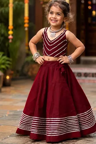 Maroon roman silk girls navratri lehenga choli set with fancy lace gota border sleeveless garba outfit