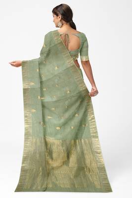 Elegant mint green linen saree with gold zari butta 2