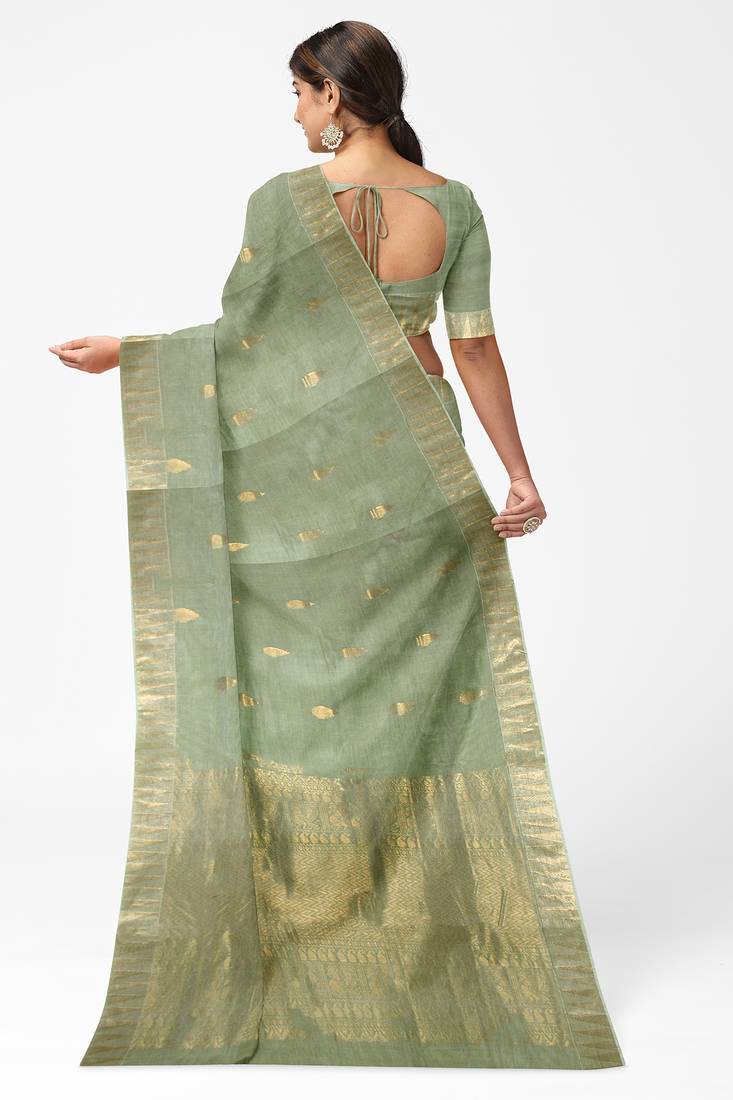 Elegant mint green linen saree with gold zari butta