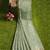 Elegant mint green linen saree with gold zari butta