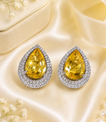 Rhodium finish honey radiance halo earrings
