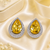 Rhodium finish honey radiance halo earrings