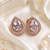 Rose gold finish crystal bloom earrings