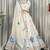 White Silk Designer Lehenga Choli with Circular Embroidery & Scalloped Dupatta
