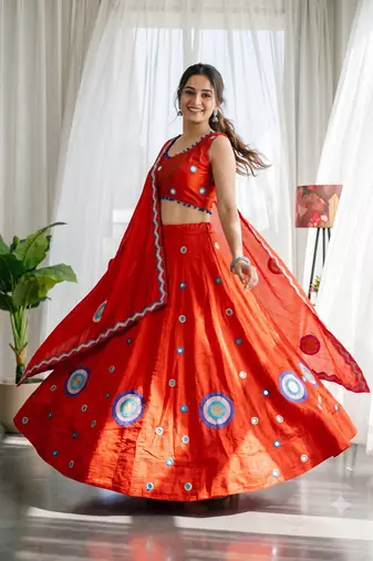 Orange silk blend Lehenga Choli with Circular Embroidery & Scalloped Dupatta