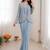 Dusty ice blue heavy crepe silk blend ready to wear saree with embroidered koti & belt