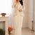 Off white heavy crepe silk blend ready to wear saree with embroidered koti & belt