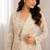 Off white heavy crepe silk blend ready to wear saree with embroidered koti & belt