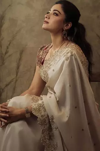 Rashmika style cream rangoli silk blend saree with sequins embroidery