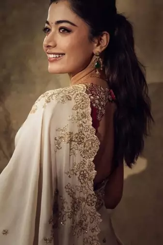 Rashmika style cream rangoli silk blend saree with sequins embroidery