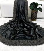 Black fendy chiffon saree with artisan hand work & swarovski blouse