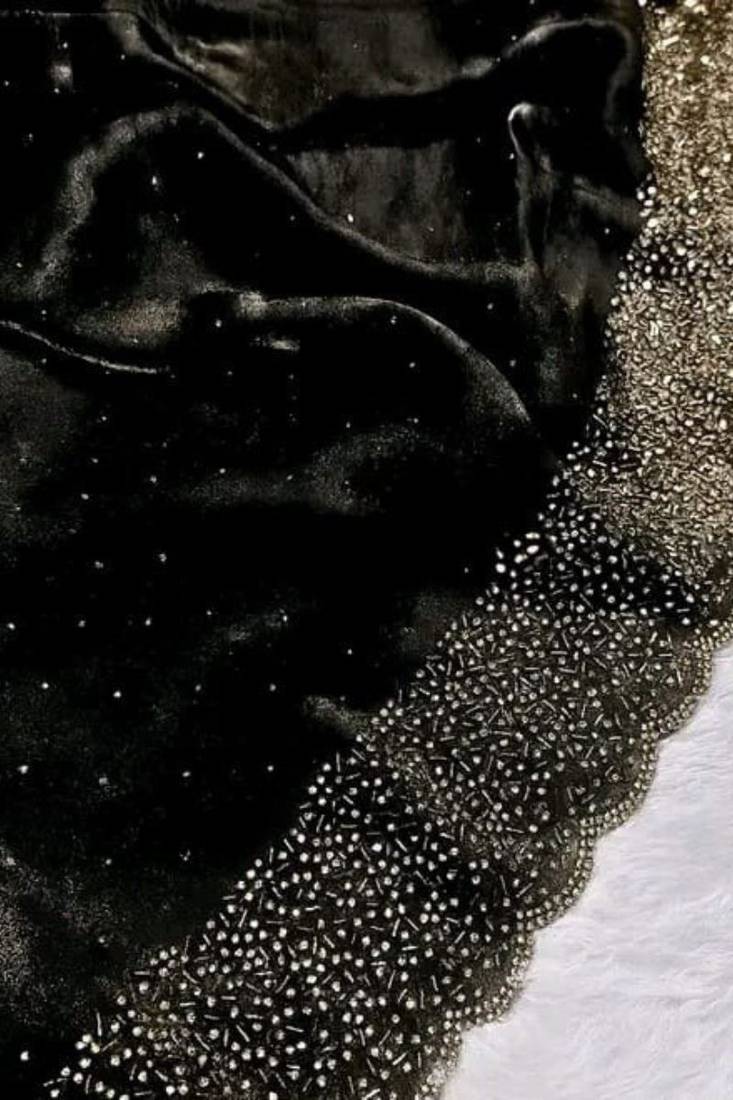 Black fendy chiffon saree with artisan hand work & swarovski blouse