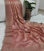 Dusty peach pink fendy chiffon saree with artisan hand work & swarovski blouse