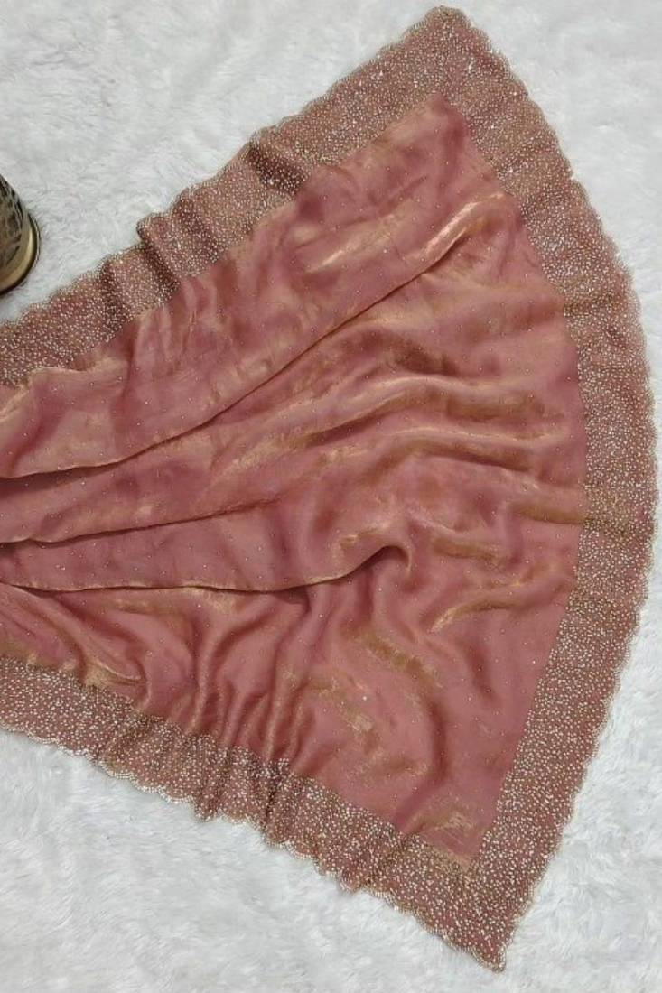 Dusty peach pink fendy chiffon saree with artisan hand work & swarovski blouse