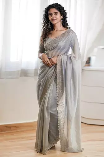 Grey fendy chiffon saree with artisan hand work & swarovski blouse