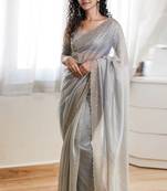 Grey fendy chiffon saree with artisan hand work & swarovski blouse