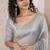 Grey fendy chiffon saree with artisan hand work & swarovski blouse